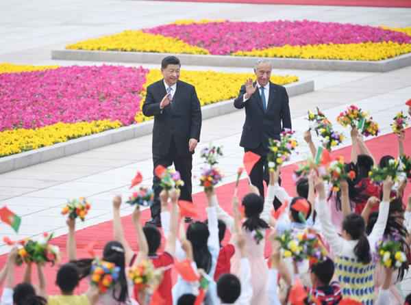 习近平举办仪式欢迎葡萄牙总统访华并同其举办谈判